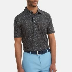 FootJoy Digital Camo FJ Print Lisle Golf Polo Shirt -Golf Clothing Shop FootJoy SS22 Digital Camo FJ Print Lisle Golf Polo Shirt Black 88437 Model 1