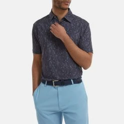 FootJoy Digital Camo FJ Print Lisle Golf Polo Shirt -Golf Clothing Shop FootJoy SS22 Digital Camo FJ Print Lisle Golf Polo Shirt Navy 88436 model 1