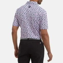 FootJoy Shadow Palm Print Pique Golf Polo Shirt -Golf Clothing Shop FootJoy SS22 Shadow Palm Print Pique Golf Polo Shirt Lavender Navy 88373 model 3