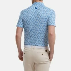 FootJoy Shadow Palm Print Pique Golf Polo Shirt 11 FootJoy Shadow Palm Print Pique Golf Polo Shirt -Golf Clothing Shop FootJoy SS22 Shadow Palm Print Pique Golf Polo Shirt Dove Grey Royal 88376 model 3