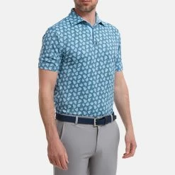 FootJoy Shadow Palm Print Pique Golf Polo Shirt -Golf Clothing Shop FootJoy SS22 Shadow Palm Print Pique Golf Polo Shirt Ink Dusk Blue 88375 model 1
