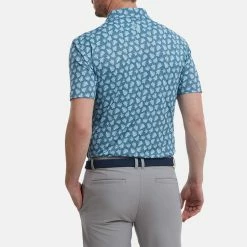 FootJoy Shadow Palm Print Pique Golf Polo Shirt -Golf Clothing Shop FootJoy SS22 Shadow Palm Print Pique Golf Polo Shirt Ink Dusk Blue 88375 model 3