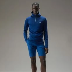 Jlindeberg J.Lindeberg Aerial 1/4 Zip Golf Hoodie -Golf Clothing Shop J.Lindeberg AW22 Aerial Quarter Hood GMJS07797 0337 SWLIN085 Navy PeonyAiry Blue Model 1