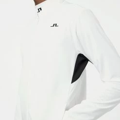Jlindeberg J.Lindeberg KV Hybrid Golf Wind Jacket -Golf Clothing Shop J.Lindeberg AW22 KV Hybrid Jacket GMOW05623 0000 WTLIN039 White Model 2