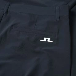 Jlindeberg J.Lindeberg Cuff Jogger Golf Trouser -Golf Clothing Shop J.Lindeberg SS22 Cuff Jogger Golf Trouser JL Navy White GMPA05574 6855 Code TRLIN020 34 W Reg Leg Detail