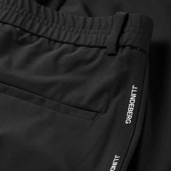 Jlindeberg J.Lindeberg Stuart Stripe Golf Trouser -Golf Clothing Shop J.Lindeberg SS22 Stuart Stripe Golf Trouser Black GMPA05716 9999 Code TRLIN022 34 W 32 Leg Detail