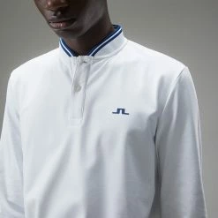 Jlindeberg J.Lindeberg Tyson Long Sleeve Golf Polo Shirt -Golf Clothing Shop J.Lindeberg Tyson LS Reg Fit Polo GMJT07801 0000 SHLIN154 WhiteNavy Peony Model 2