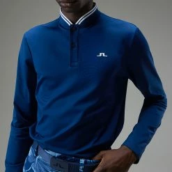 Jlindeberg J.Lindeberg Tyson Long Sleeve Golf Polo Shirt 10 Jlindeberg J.Lindeberg Tyson Long Sleeve Golf Polo Shirt -Golf Clothing Shop J.Lindeberg Tyson LS Reg Fit Polo GMJT07801 0337 SHLIN153 Navy PeonyWhite Model 2