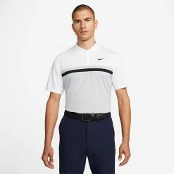 Nike Dry Victory Colourblock Golf Polo Shirt 9 Nike Dry Victory Colourblock Golf Polo Shirt -Golf Clothing Shop Nike SS22 Dry Victory Colourblock Golf Polo Shirt DH0845 100 M White Lt Smoke Grey Black model 1