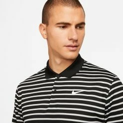Nike Dry Victory Stripe Golf Polo Shirt 10 Nike Dry Victory Stripe Golf Polo Shirt -Golf Clothing Shop Nike SS22 Dry Victory Stripe Golf Polo Shirt DH0829 010 M Black White model 2
